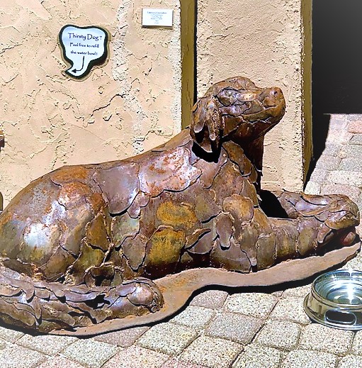 Metal Sculpture Dog Waiting to Greet Visitors In Our Gallery Court Yard 